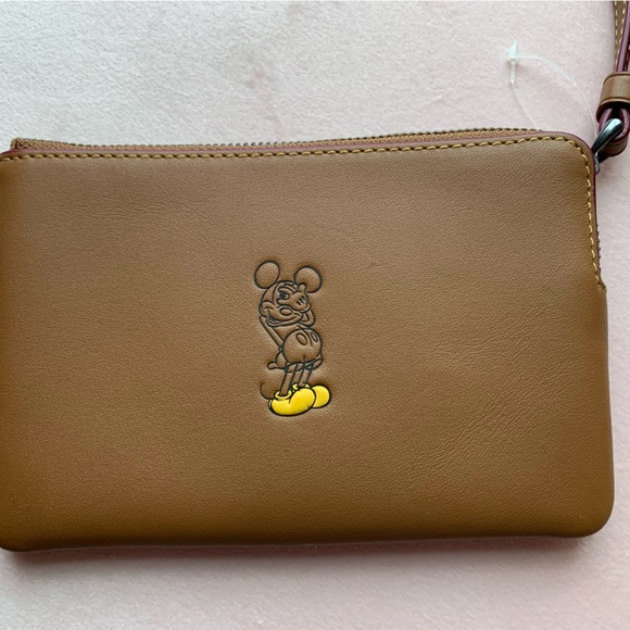 Coach Handbags - 🎉Rare Disney Mickey Mouse F59528 Leather Zipper Wristlet brown saddle